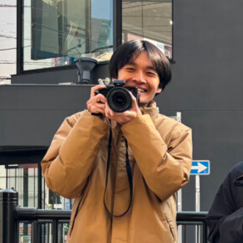 劉